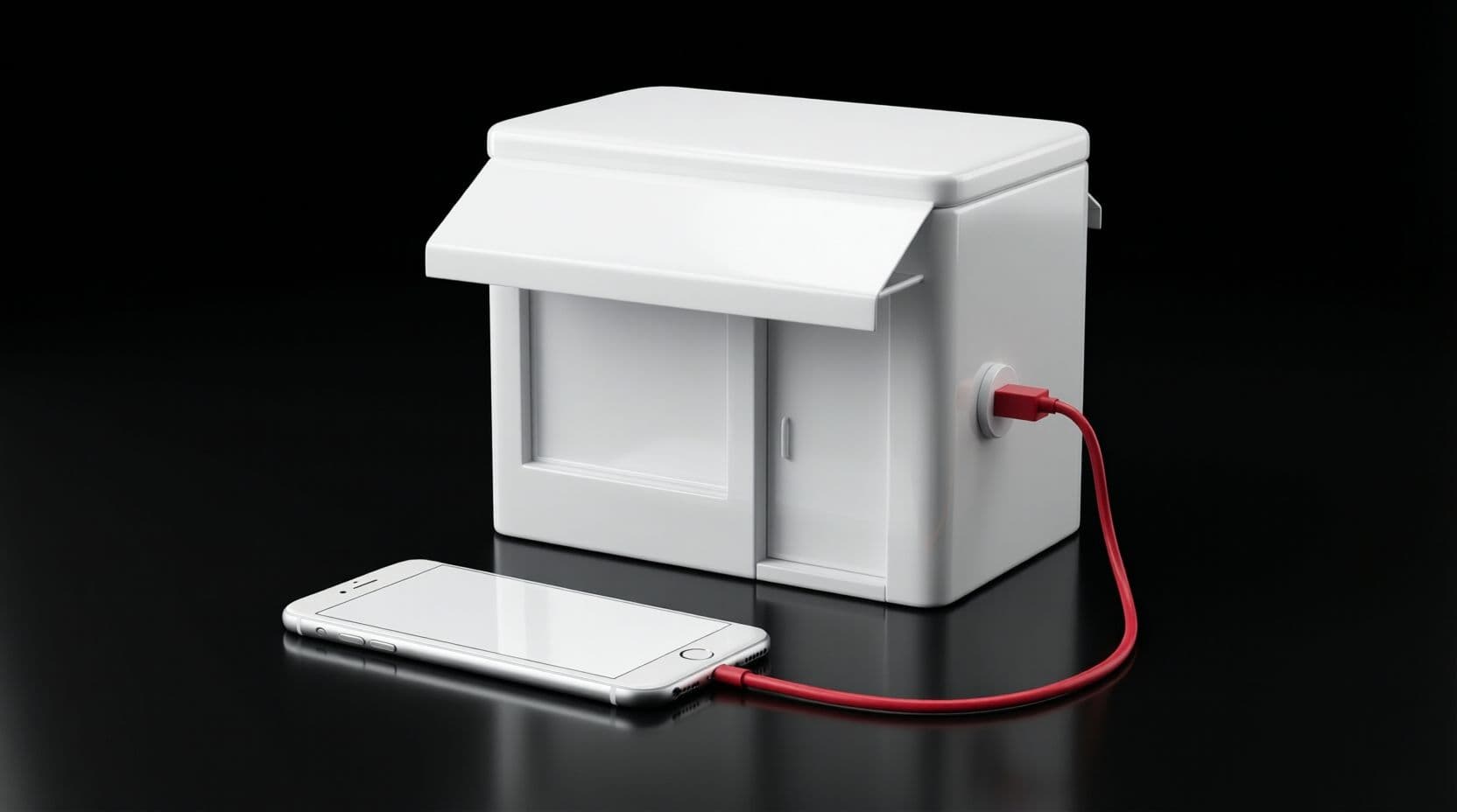 A miniature glossy white shop front with an awning on a black surface, and a slim white smartphone in front of it, joined by a single thin red cable that plugs into a small socket on the side of the shop.